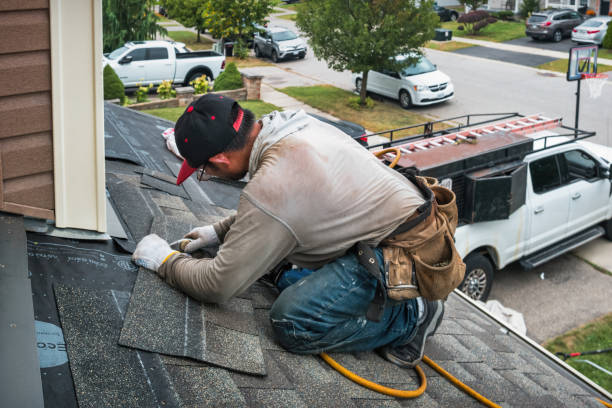 Professional Roofing technician working in South Lima, NY